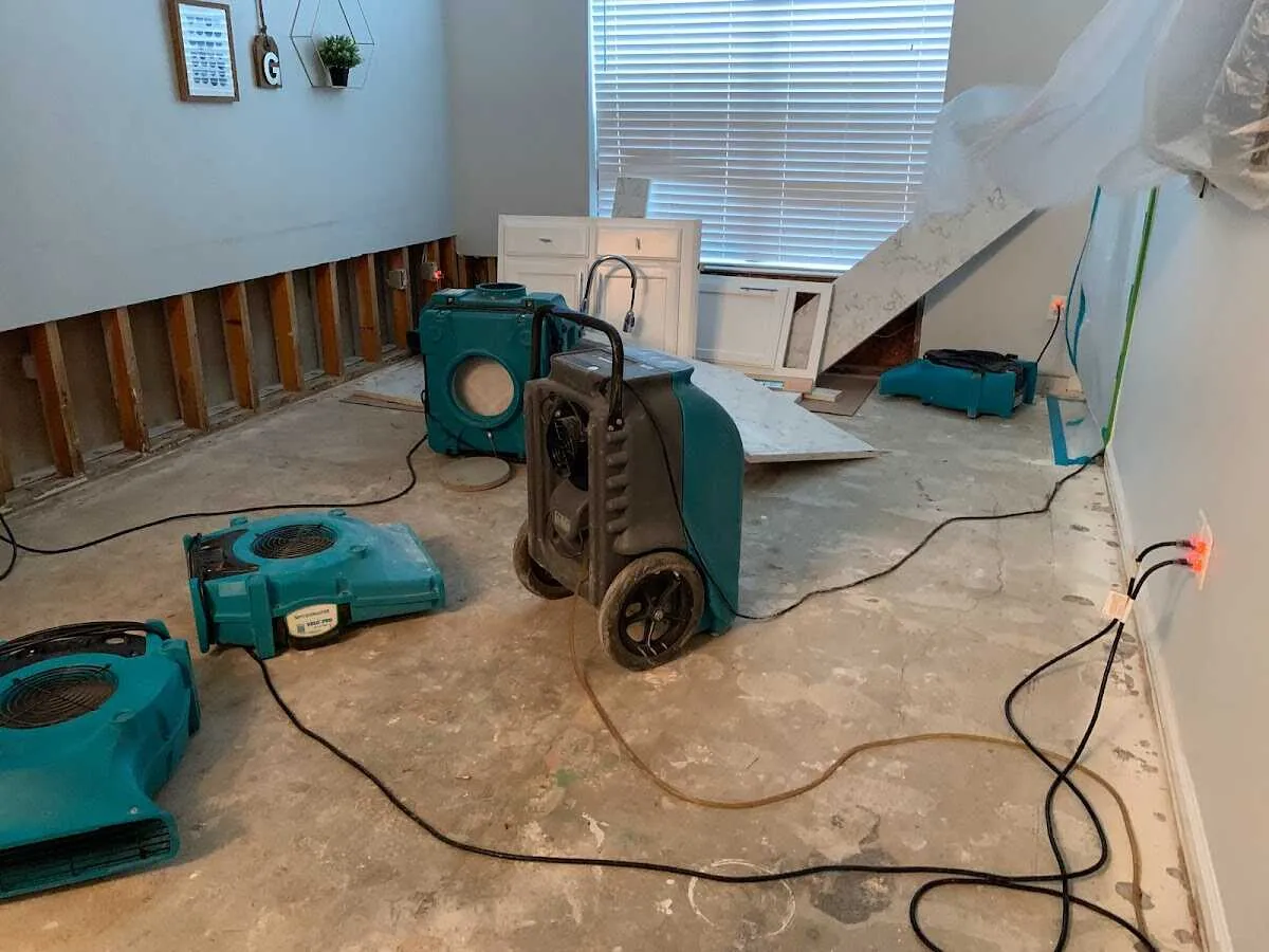 Dehumidifier in flood-cut room for Water Damage Restoration in Toledo